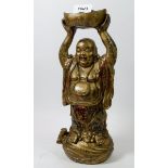 A Chinese painted metal Buddha holding basket aloft, 30.5cm