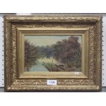 An oil on board depicting a river scene in a gilt frame, monogrammed 'M.W', dated 1912, 14 x 22cm