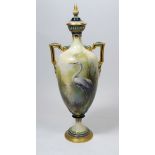 A James Hadley Worcester two handled vase and cover painted heron, 29cm