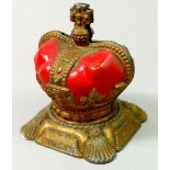 A 1953 Queen Elizabeth Coronation crown form painted metal money box, 9cm tall