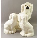 A pair of Beswick Staffordshire style dogs and a Victorian one 33cm tall