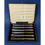 A set of six silver handled tea knives boxed