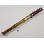 A small brass and leather clad telescope by Ezekiel of Exeter, 37cm extended