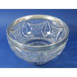 A cut glass bowl with a silver rim, Birmingham 1923