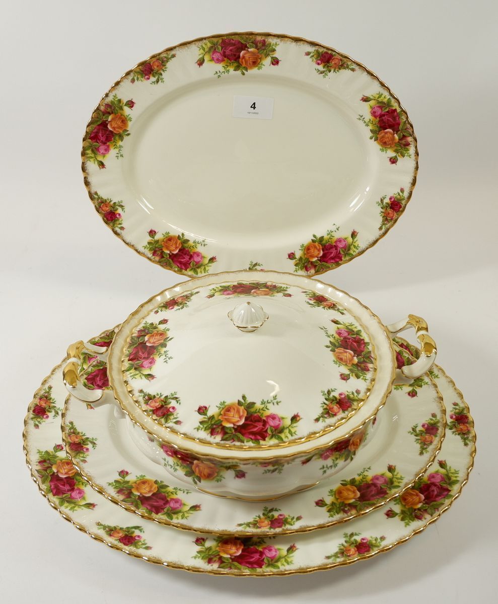 A Royal Albert dinner service comprising: two covered tureens, one oval serving dish, twenty