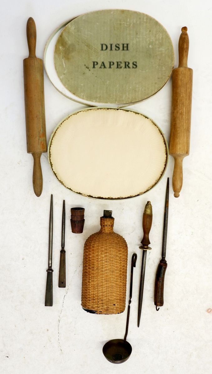 A group of vintage kitchenalia including rolling pins, small copper moulds, sharpening steels,