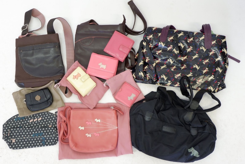 A selection of eight various Radley handbags and purses