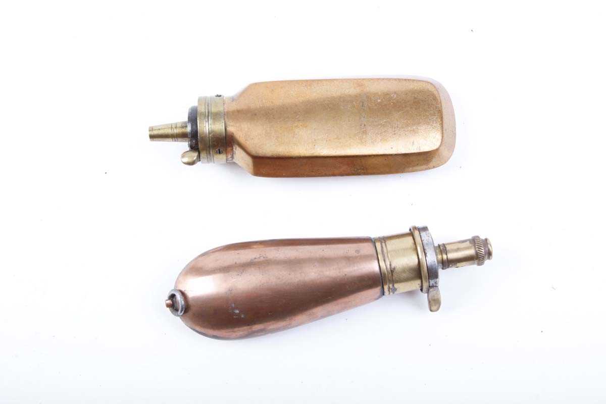 Copper and brass bag shaped pistol powder flask with suspension ring by G & J W Hawksley and one