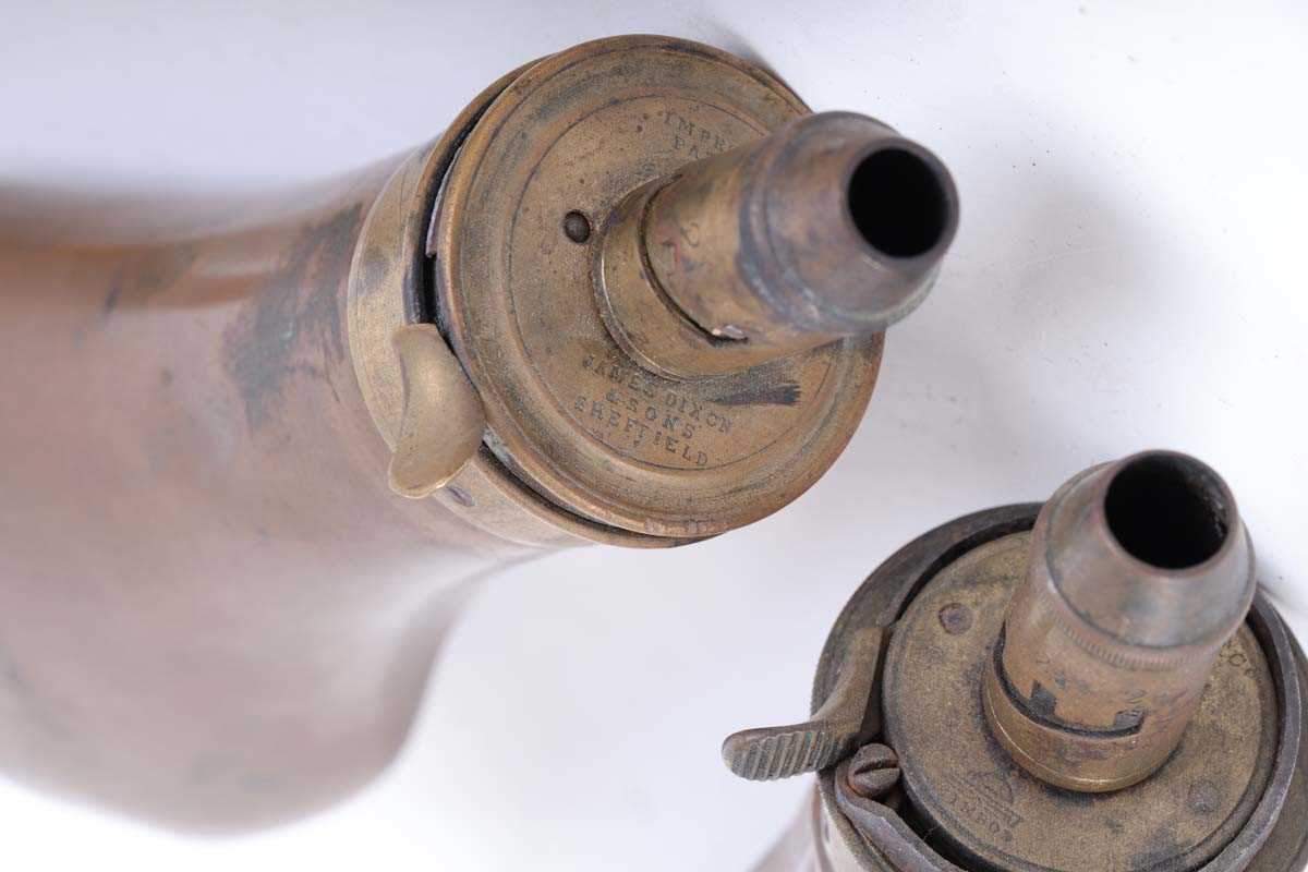 Three copper and brass powder flasks, two by Bartram with embossed decoration and a plain one by - Image 3 of 3