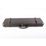 Leather gun case monogrammed E.A.G., red baize lined interior fitted for 30ins barrels, with