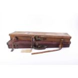 Canvas gun case with interior fitted for 30 ins barrels, and another canvas gun case for restoration