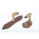 Two taxidermy deer foot wall hangers, plaque mounted