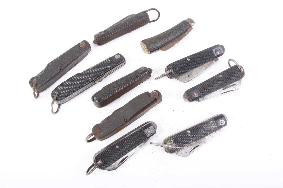 Bag containing ten various large folding pocket knives