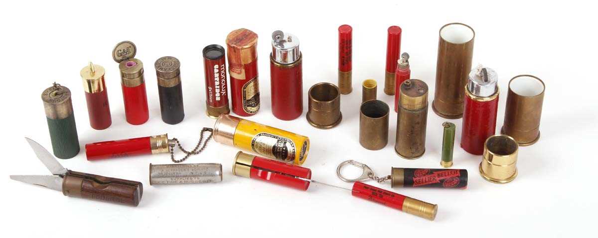 A group of collectors novelty items such as penknives, keyrings, cigarette lighters etc, all in