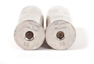 A pair of 12 bore nickle plated snap caps, head stamped Holland & Holland