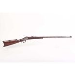 (S58) .32-40 Winchester 1885 lever action rifle, 30 ins octagonal heavy barrel, the top flat