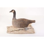 Five vintage 'Johnson's Folding Goose Decoys' in canvas bag with rods