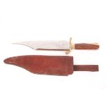 Alamo type bowie knife, 13 ins brass-backed blade, brass guard, wood grips, in leather sheath