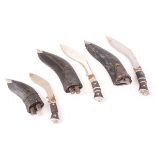 Three Kukri knives: 8½ ins, 9 ins, and 6 ins blades, each with decorative etching to blade and in