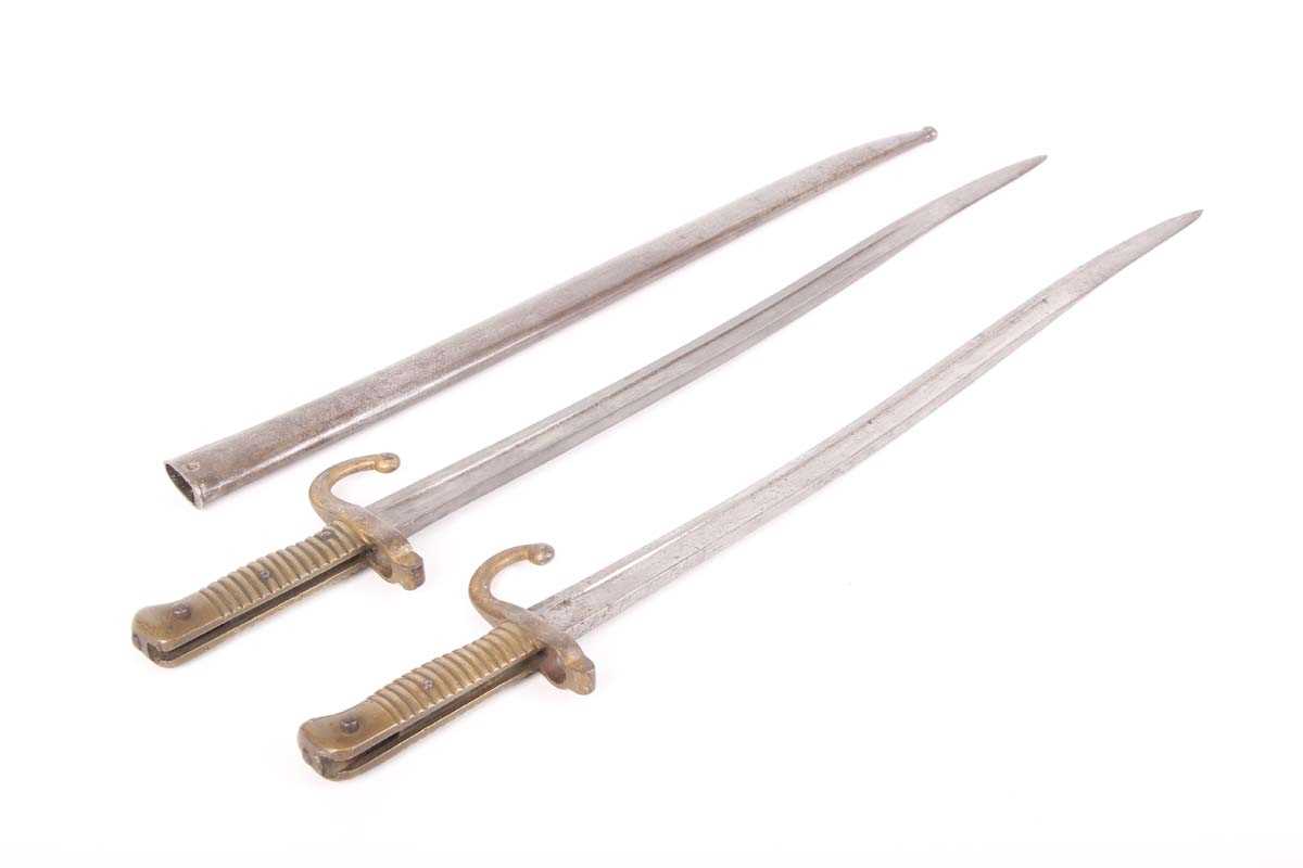 Two Chassepot bayonets, each with a 23 ins slightly curved and fullered blade, brass grips, one with - Image 2 of 5