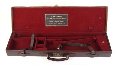 A good leather gun case with claret baize lined fitted interior for 30 ins barrels, W. W. Greener