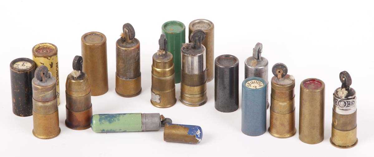 Nine various collectors cigarette lighters, all in the form of shotgun cartridges, Eley-Kynoch 16