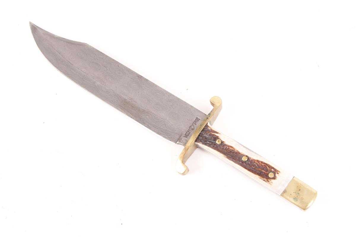 Valley Forge Damascus steel bowie knife, 11 ins blade, brass guard, horn grips, brass pommel, in - Image 2 of 5