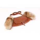 F.Schulz, Wien (Vienna) brown leather and fur lined hand warmer with front pocket and strap