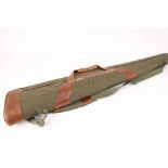 Beretta padded shotgun slip in green and brown finishSome tarnish to leather under handle