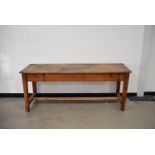 A Victorian pitch pine kitchen table, 60cm D by 185cm W