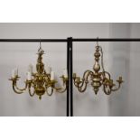 A brass eight branch chandelier, together with a wooden painted five branch chandelier, painted