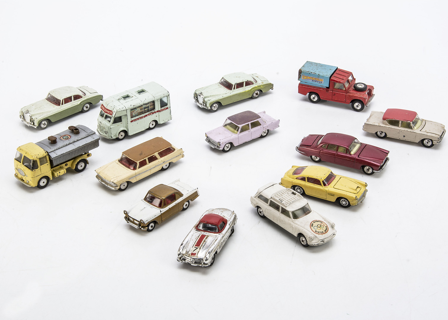 Playworn Corgi Toys, including 224 Bentley Continental Saloon (2), 219 Plymouth Sport Suburban,