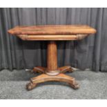 A William IV rosewood card table, of shaped rectangular design (missing folding section) on column