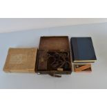 A mixed lot of collectables, including The Art of Hairdressing, a cased Bakelite hair clippers,