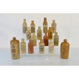 A collection of 19th century Black Country stoneware ginger beer bottles, including B. Stockton West