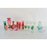 A quantity of coloured and colourless glassware, including a Murano gilt decorated flared vase, a