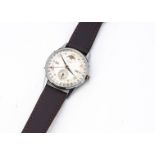 A c1950s Record Datofix chromed monophase gentleman's wristwatch, 33mm, silvered dial having seconds