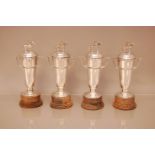 A collection of four Indian silver horseracing trophies and covers, 19cm, each won by Joe Mercer