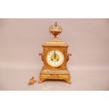 An Edwardian gilt metal mantle clock, 43cm, AF, one support loose, with eight day movement