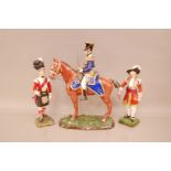 Three Sitzendorf porcelain military figures, one a 17th Lancer on horseback, 37cm, a figure of a Sea