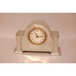 An Arts & Crafts pewter mantle clock, 29cm wide, lacks rear cover