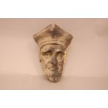 An antique carved stone ecclesiastical head, 28cm, the possibly 16th century period head of a man