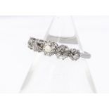 An old cut diamond five stone dress ring, the claw set old cuts all in platinum, total diamond