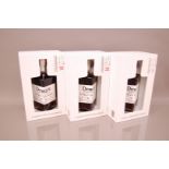 Three 500ml bottles of Dewar's whisky, each boxed, two 32 years aged the other 21 years aged (3)