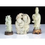 Three Chinese jadeite jade carved figures including a man and lady group, 14cm, a figure of