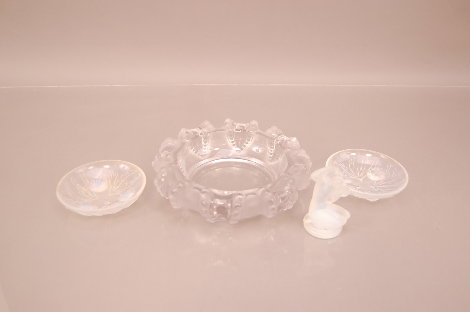 A vintage Lalique glass cigar ashtray,119cm, together with a small Lalique glass figure of a lady