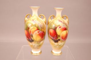 A pair of early 20th century Royal Worcester Porcelain vases, ovoid form with short flared neck