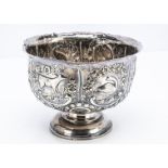 An Edwardian silver footed bowl by TH, with raised designed to outer, 11.4 oz., 20.5cm diameter,