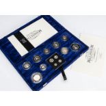 A Royal Mint UK Millennium Silver Collection, the blue velvet fitted case with 9 coins and four coin