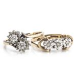 Two diamond illusion set dress rings, comprising a three stone example in 9ct gold, ring size M